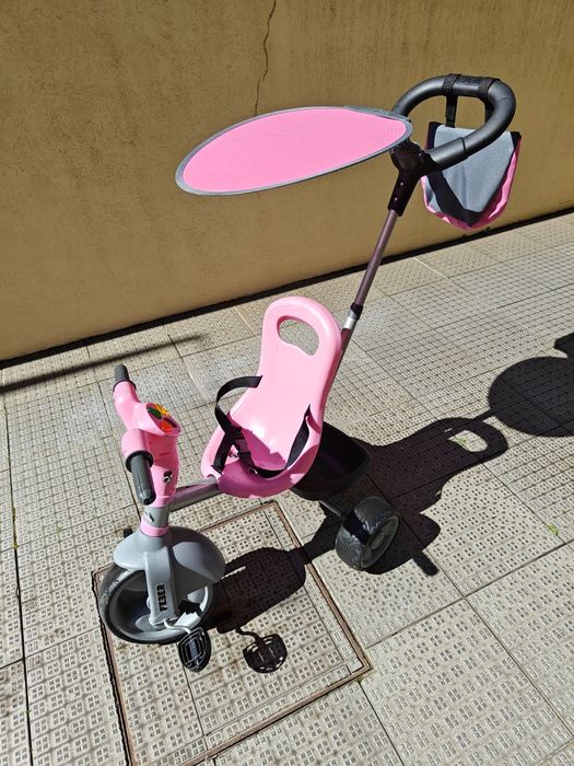Triciclo Feber Baby Plus Music Pink - 50% desconto