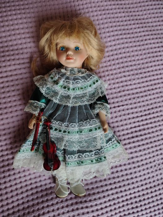 Вінтажні фарфорові кукли