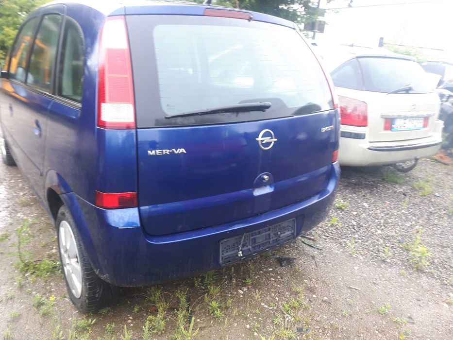 Opel Meriva 1,7 D 04 r.. -Klapa tył , lampy  środek i inne