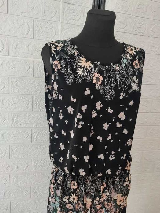 Kombinezon rozmiar L elastyczny cena 30 zł