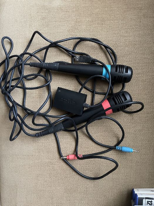 Jogos PS2/PS1 e microfones SingStar