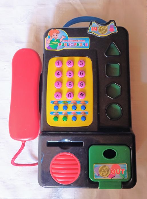 Telefone público de brincar anos 70/80.