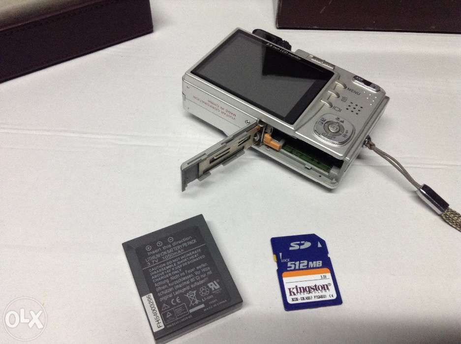 Máquina fotográfica a bateria