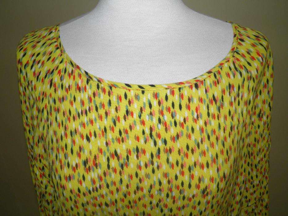 Camisa ¾ de manga, muito leve, jovial e eclética