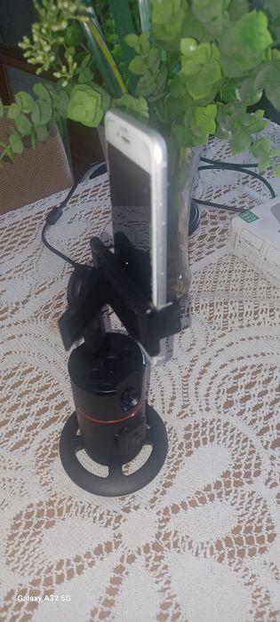 Suporte de telemóvel com restreamento automática de rosto