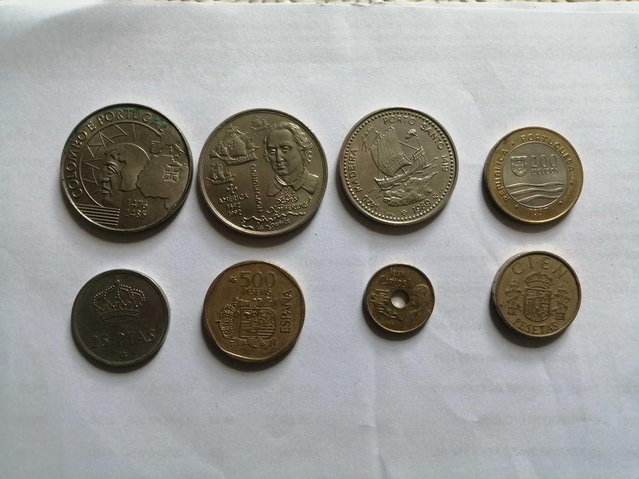Moedas antigas de escudos e pesetas