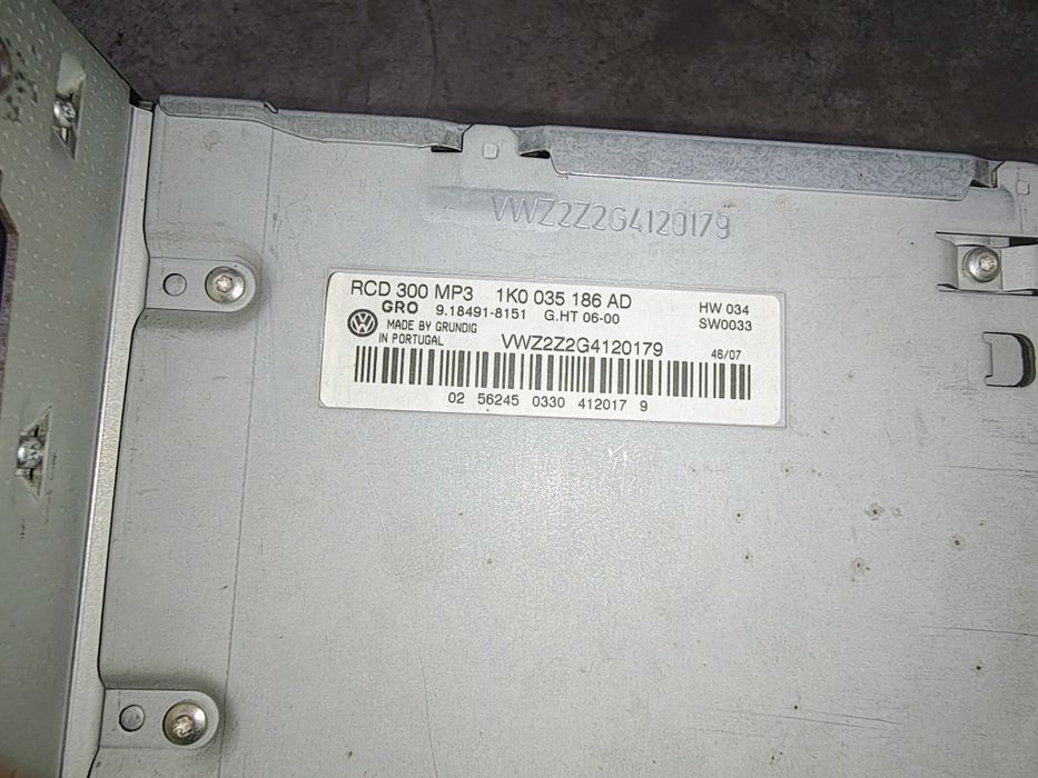 Passat B6 radio CD MP3 plus kod 1K0.035.186AD