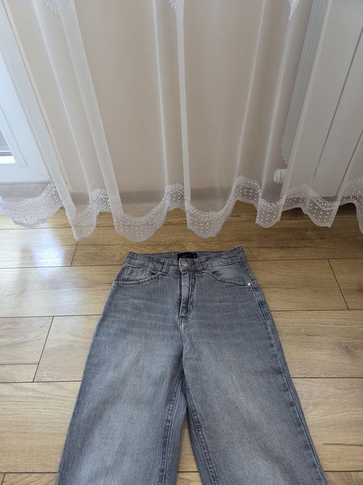 Spodnie jeansy Mohito rozmiar 34