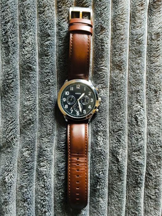 Relógio fóssil em boas condições sem pilha