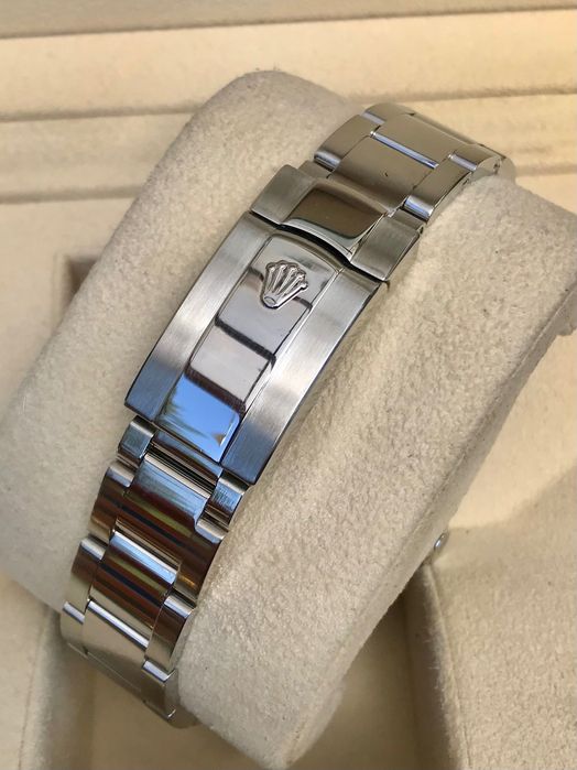 Rolex Milgauss Green sapphire.