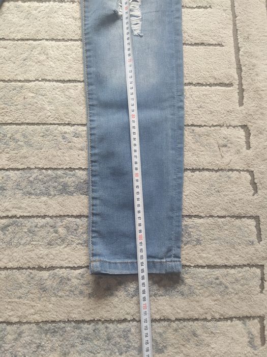 Spodnie skinny jeans z dziurami roz 31/L32