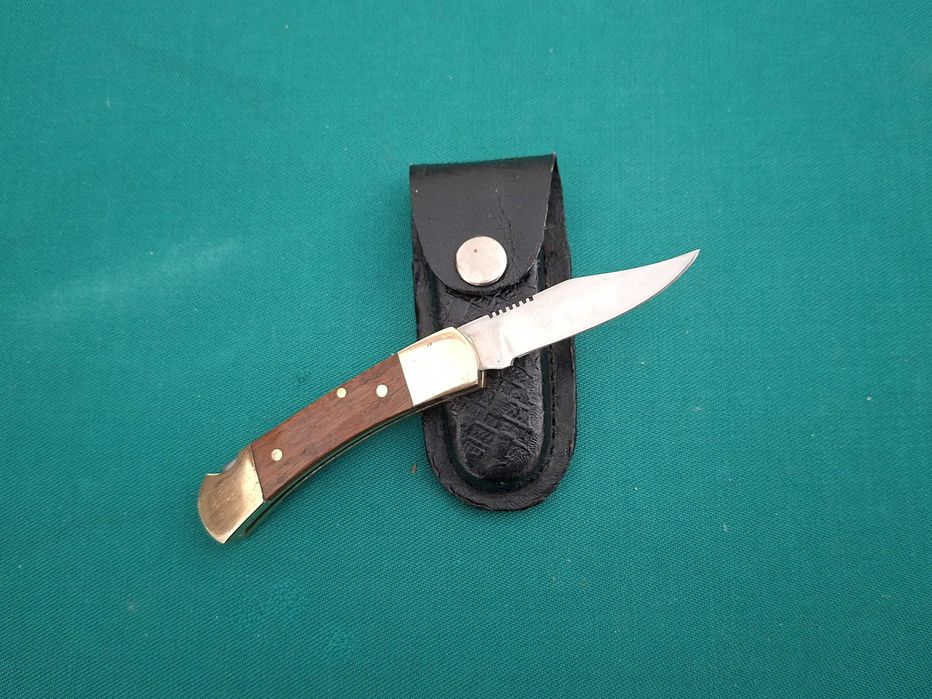 Pequeno canivete antigo em latão, com bolsa em pele