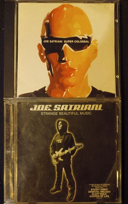 Joe Satriani Strange Beautiful Music / Super Colossal