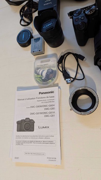 Bezlusterkowiec Panasonic Lumix DMC-G80, wraz z obiektywami i torbą.