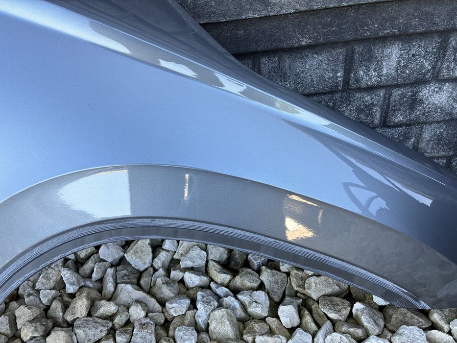 Blotnik przedni prawy bez rdzy Skoda Karoq 57A 17- oryginal LF7C