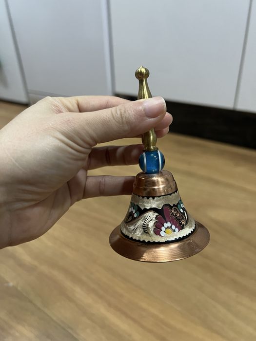 Sino decorativo com olho turco