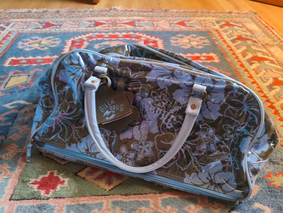 Bilabong brand travel suitcase and toiletry bag