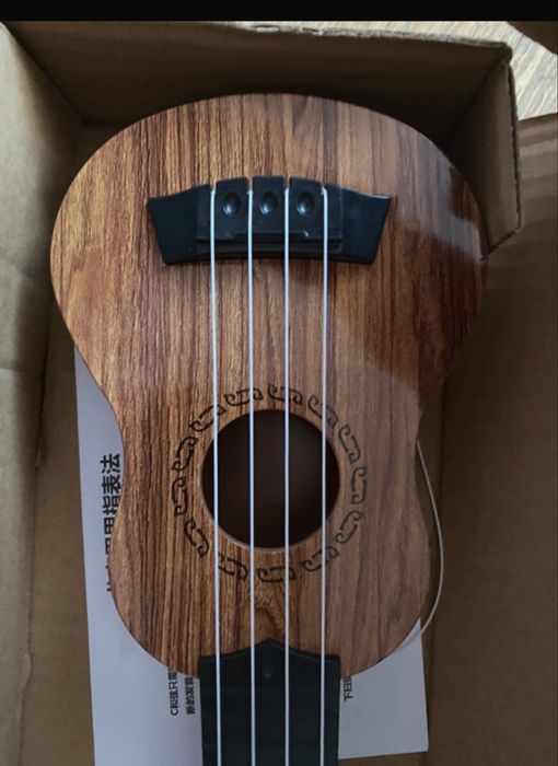 Mini ukulele instrument dla dzieci