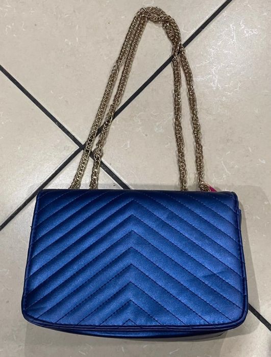 Mala azul metalizada ysl