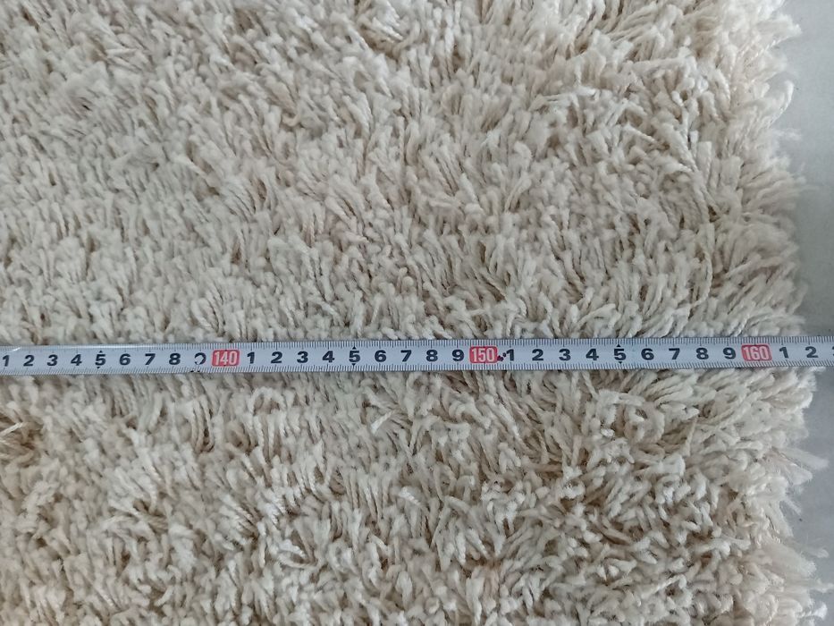 Tapete bege pêlo alto