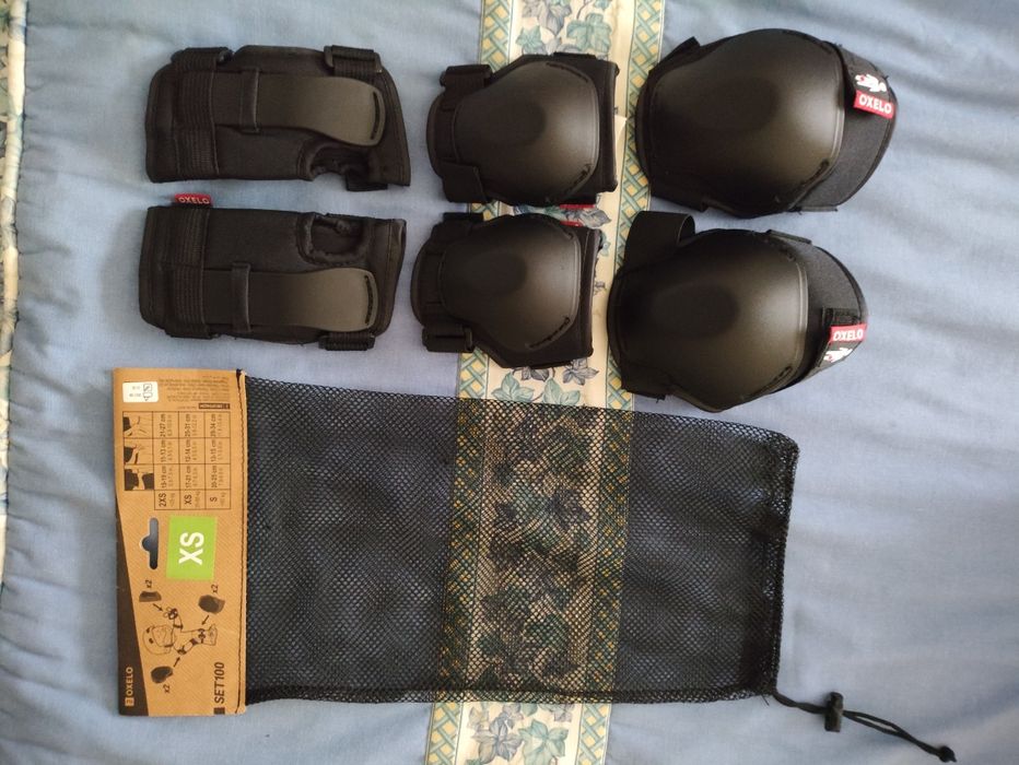 Conjunto proteções Oxelo pretas tamanho XS