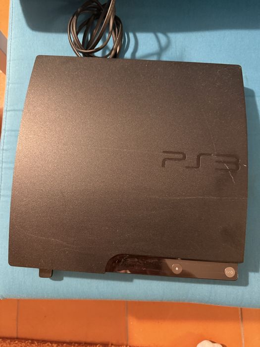 Playstation 3  + comando + jogos