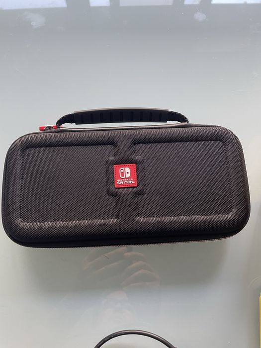 Nintendo switch lite + bolsa