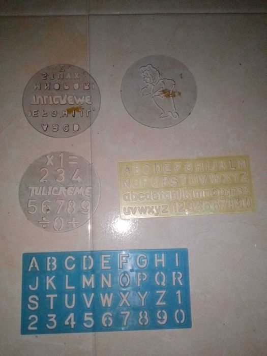 Réguas , transferidores, esquadros e letras manuais
