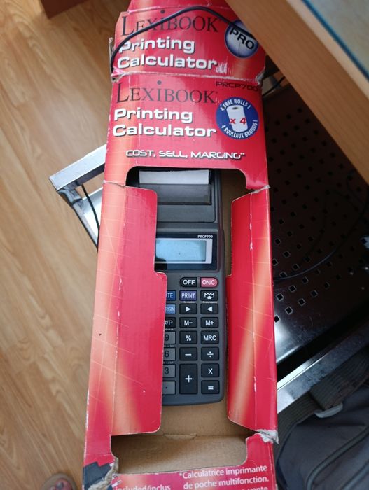 Calculadora com rolos extra.Nao está a trabalhar direito.