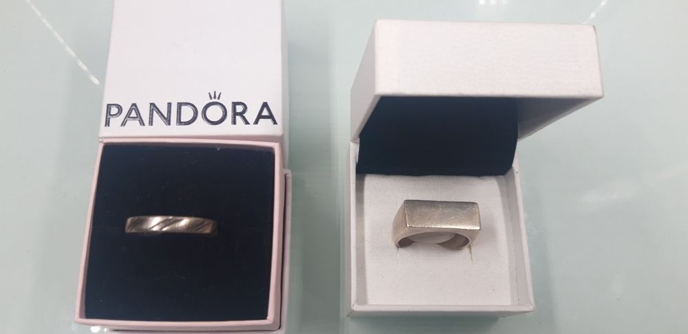 2 aneis de prata 925 ler discrição.