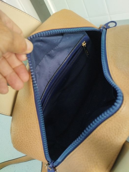 Malote da tous original em pele como nova.