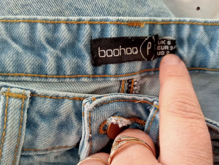Spodnie dżinsowe z dziurami rozdarciami rozmiar 34 Boohoo
