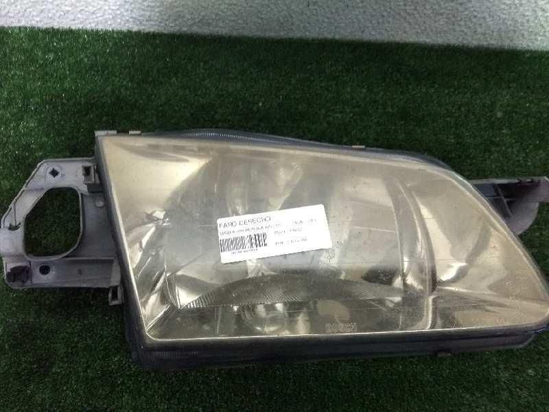 farol direito mazda 323