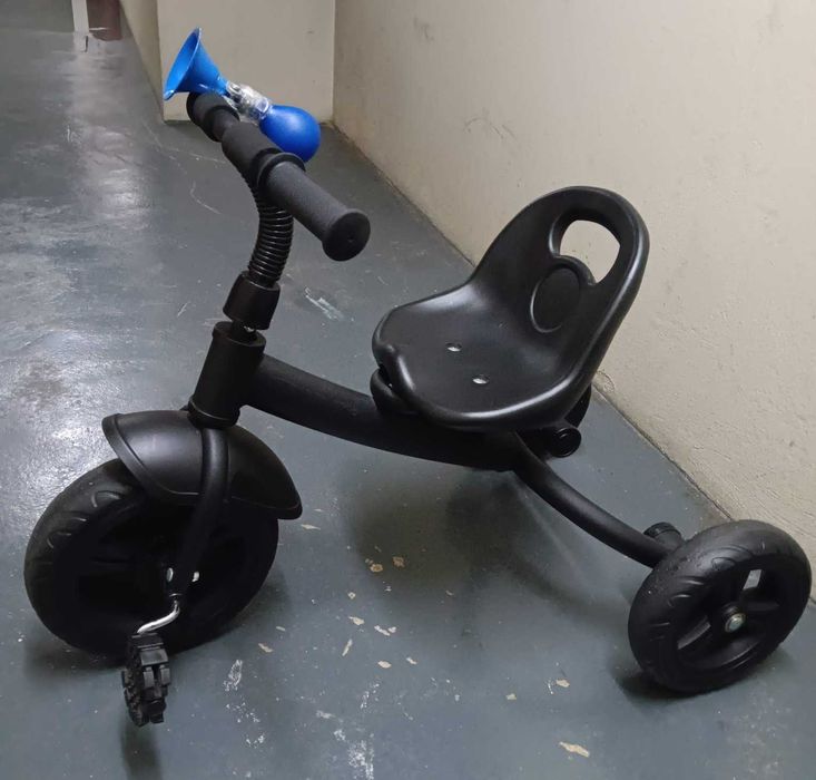 Triciclo infantil