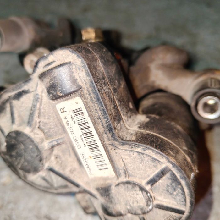 Zacisk hamulcowy elektryczny prawy, lewy tył Ford Mondeo MK5, Kuga