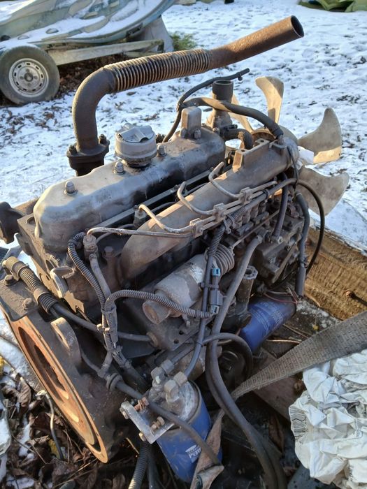 Silnik Kubota 4 cylindrowy