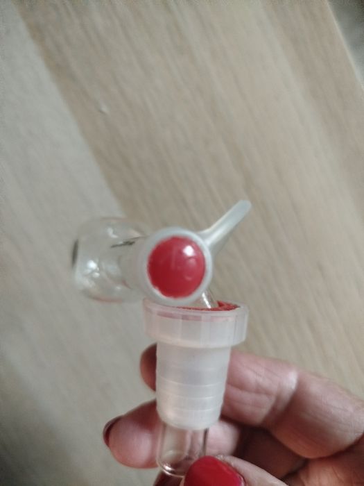 Objeto medidor de quantidade de álcool  .