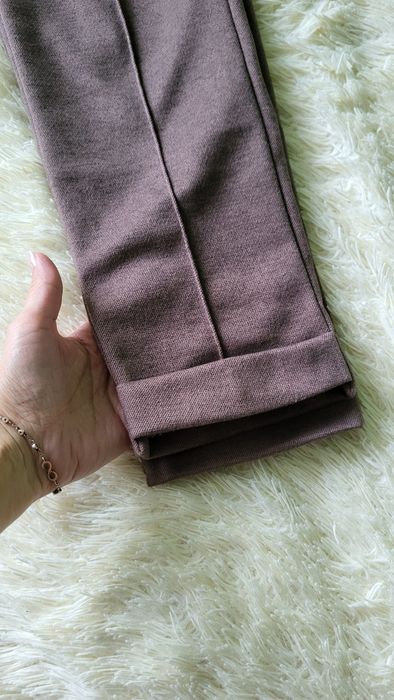 Штани коричневі теплі 42