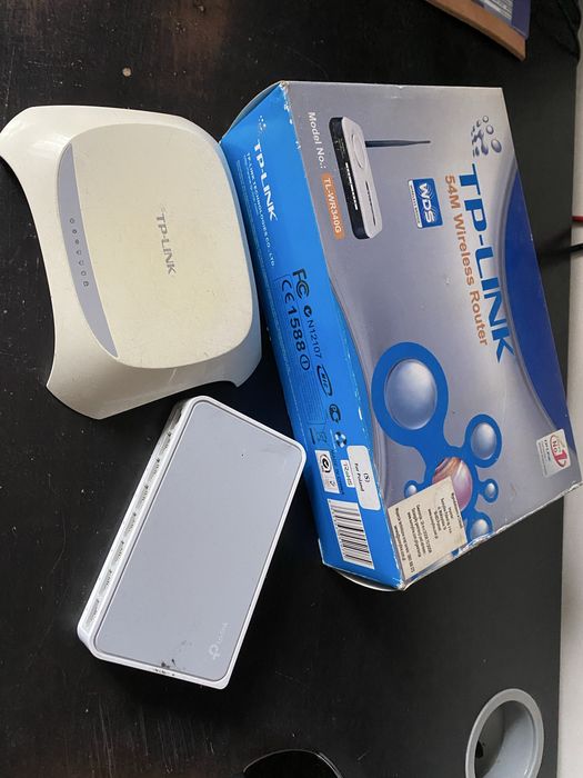 Dwa routery i switch tplink