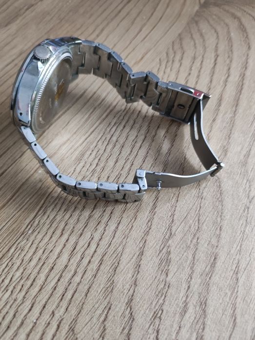 Zegarek męski , bransoletką CURREN.