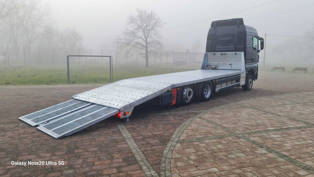 Najazd platforma ciężarowe trzyośka zabudowa laweta MAN TGM Hydraulika