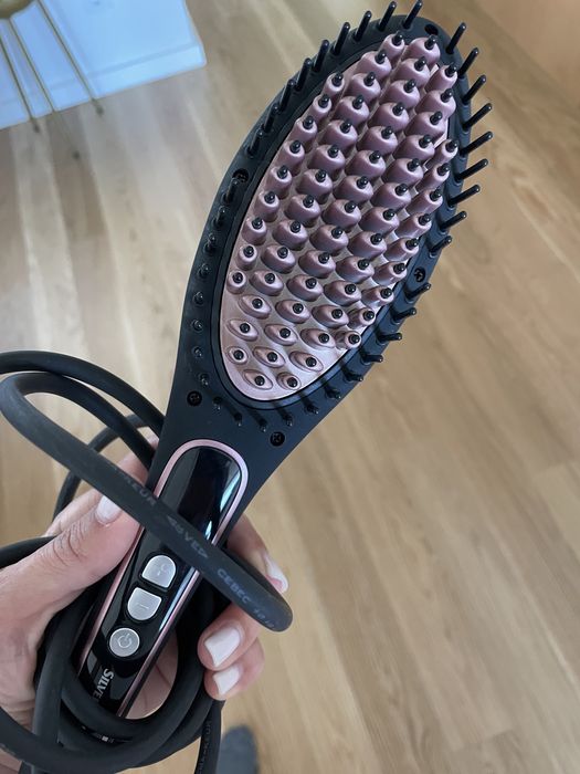 Escova de cabelo elétrica