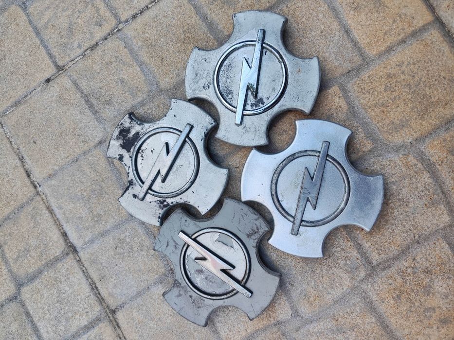 Tampões centro de jantes Opel Tigra