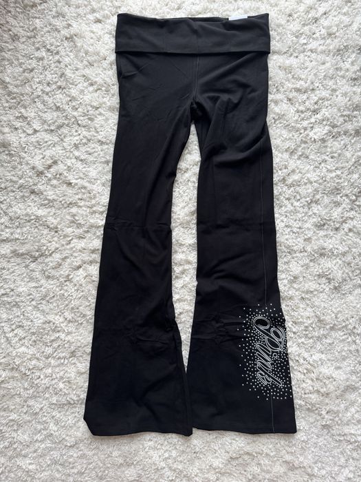 Czarne legginsy flared Victoria's Secret z cekinami