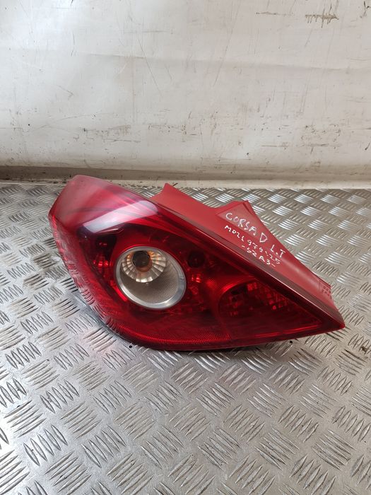 Lampa Lewa Tył + Wkład 13186350 Opel Corsa D 07R- Europa