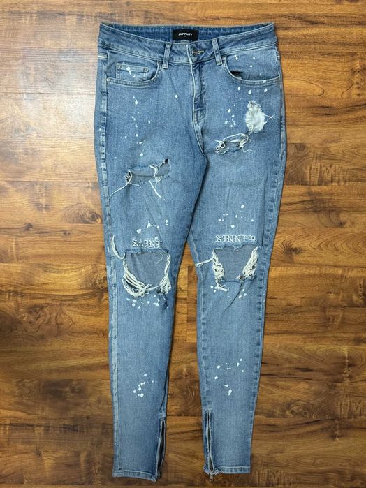 Spodnie jeansowe z rozdarciami dziurami jeansy Sinner Jaffary W28 L 40