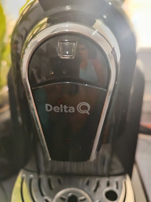 Máquina de café Delta com suporte para cápsulas