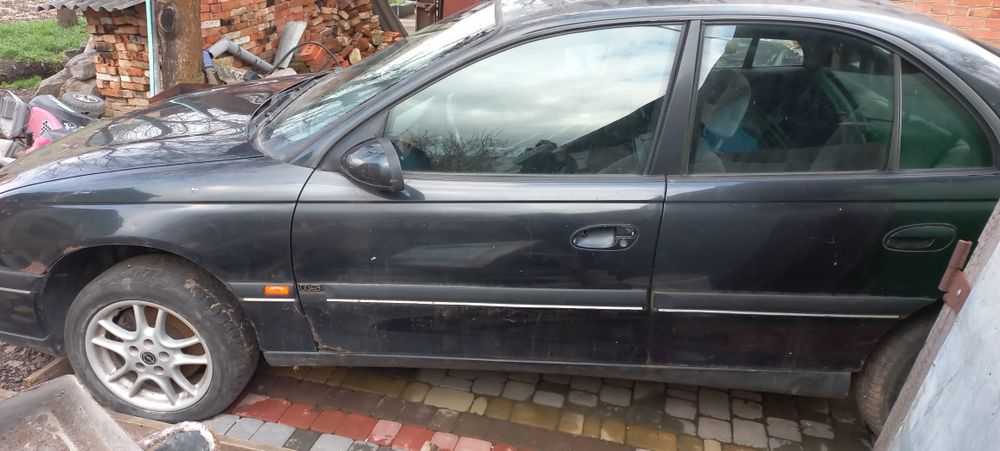 Opel  Omega (по тел)