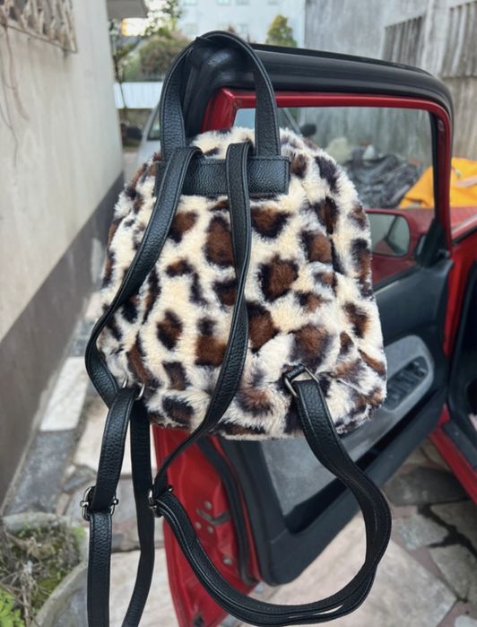 Mochila de pelo elegante64738199655937122