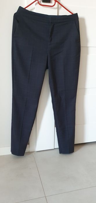 Eleganckie spodnie w kratę Reserved